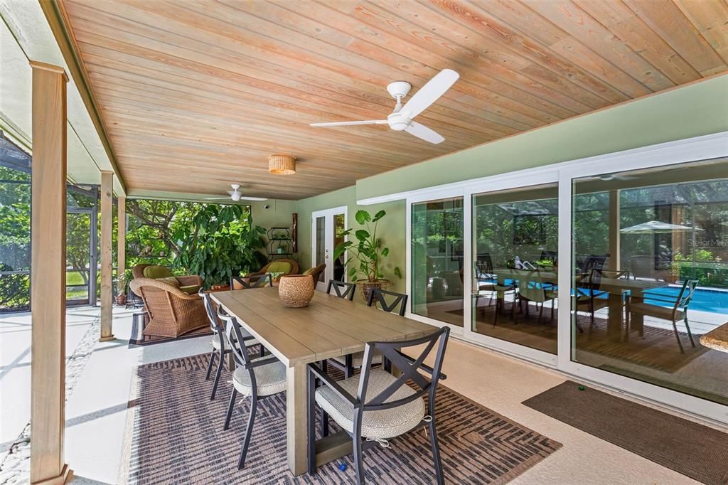 Glass-sliding pocket doors open to kitchen