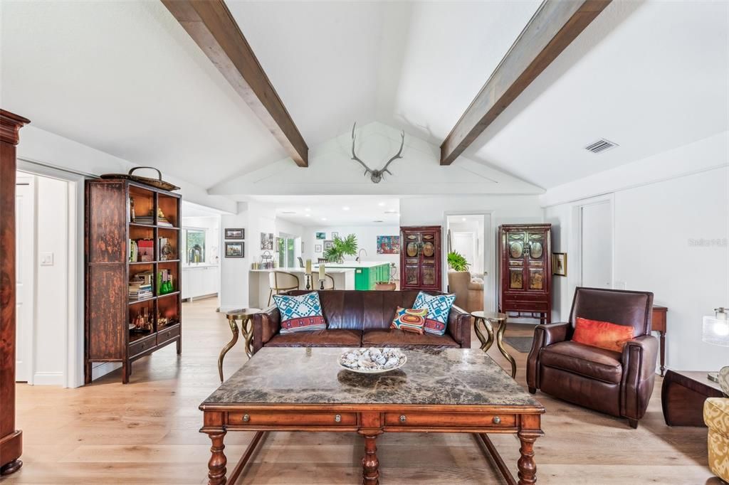 Great room looks toward kitchen and den