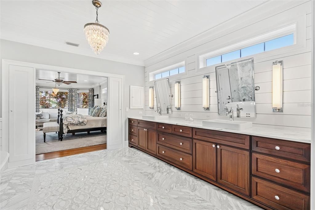 Primary Bathroom with heated Calcutta Gold marble floors