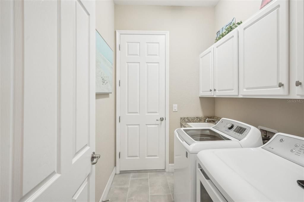 Laundry Room with Storage Cabinets