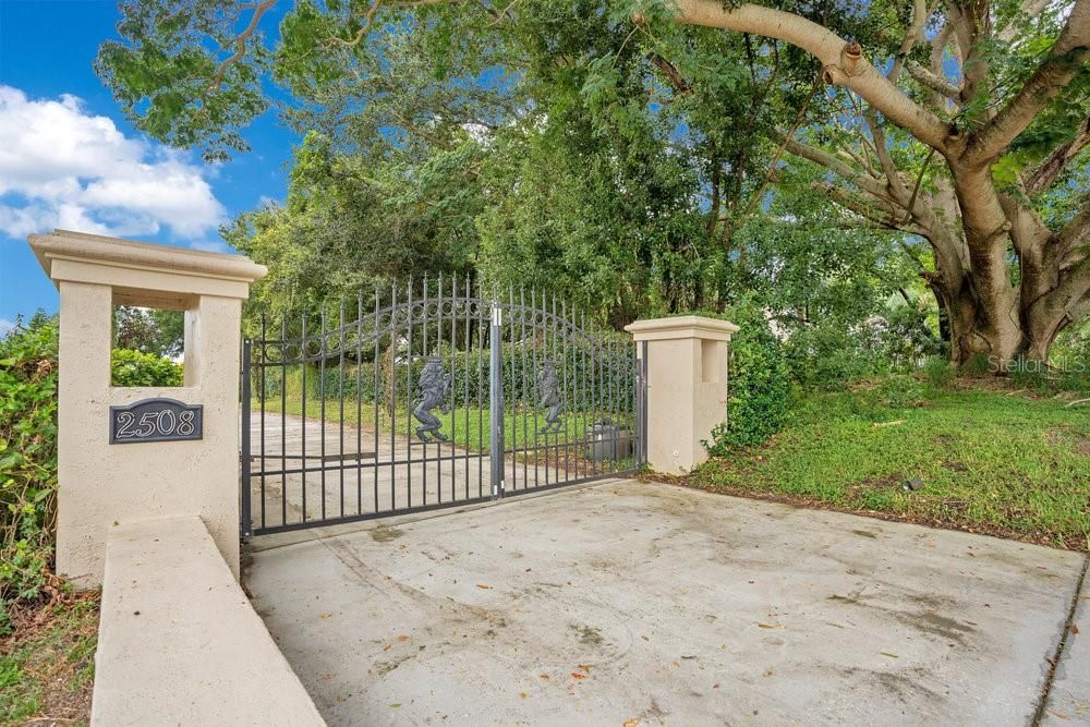 Private entrance with double Iron gate.