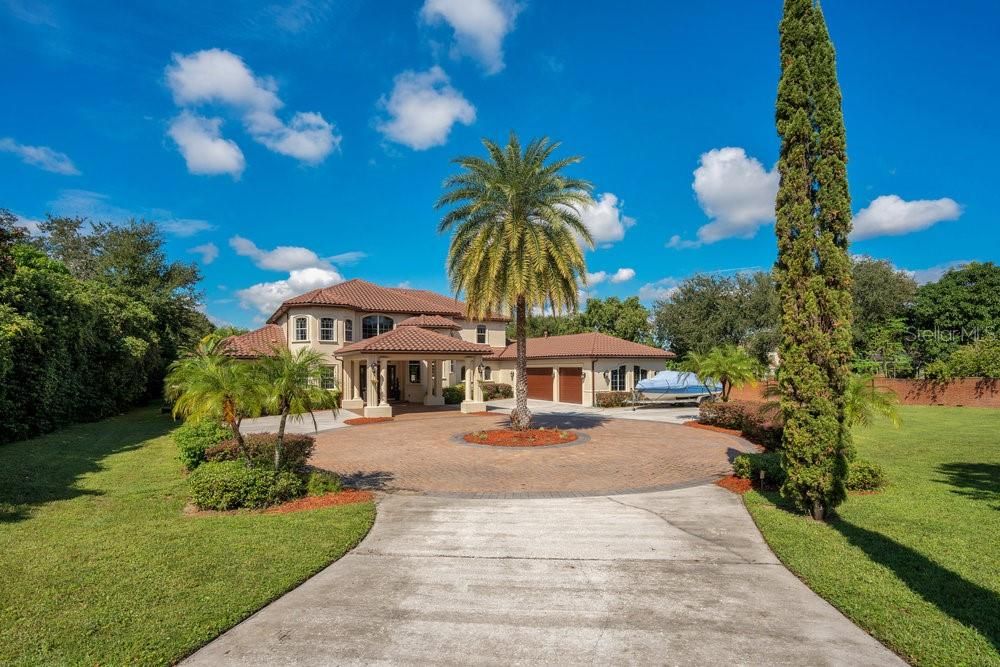 Wide circular paved driveway