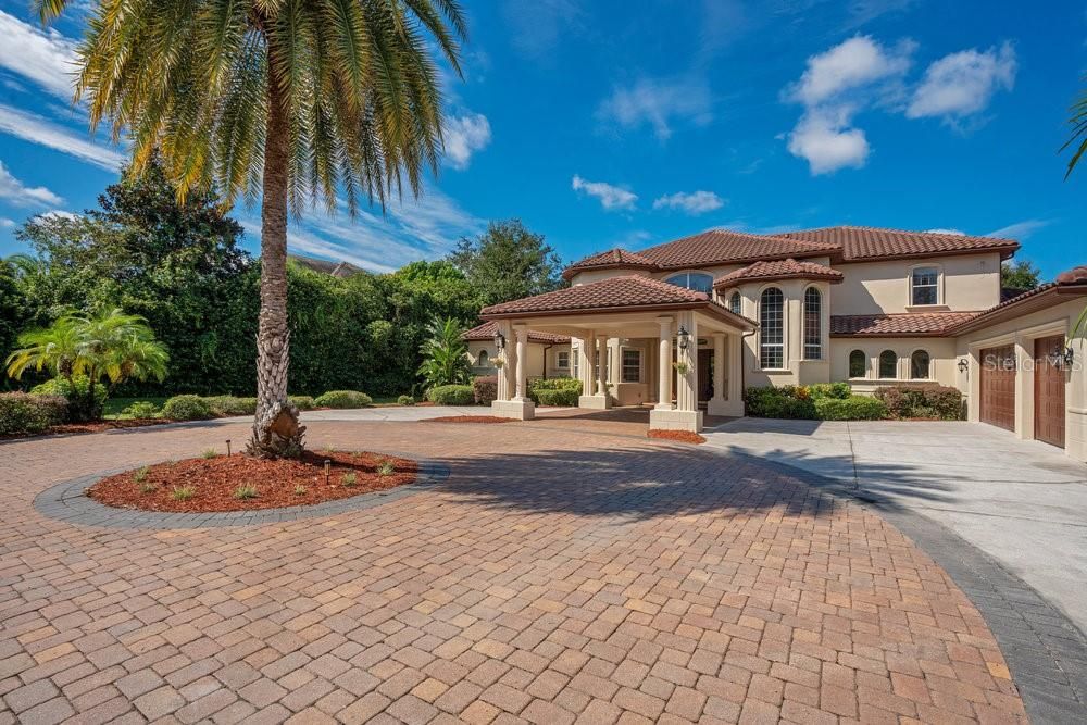 Grand entrance with double car Porte Cochere