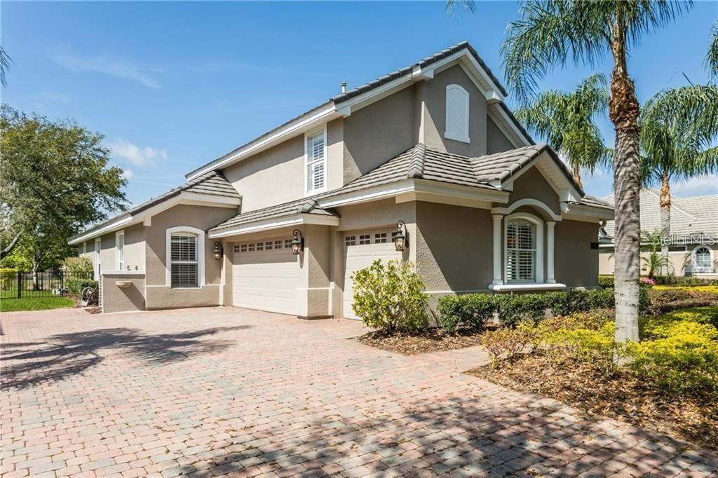 Driveway and three car garage