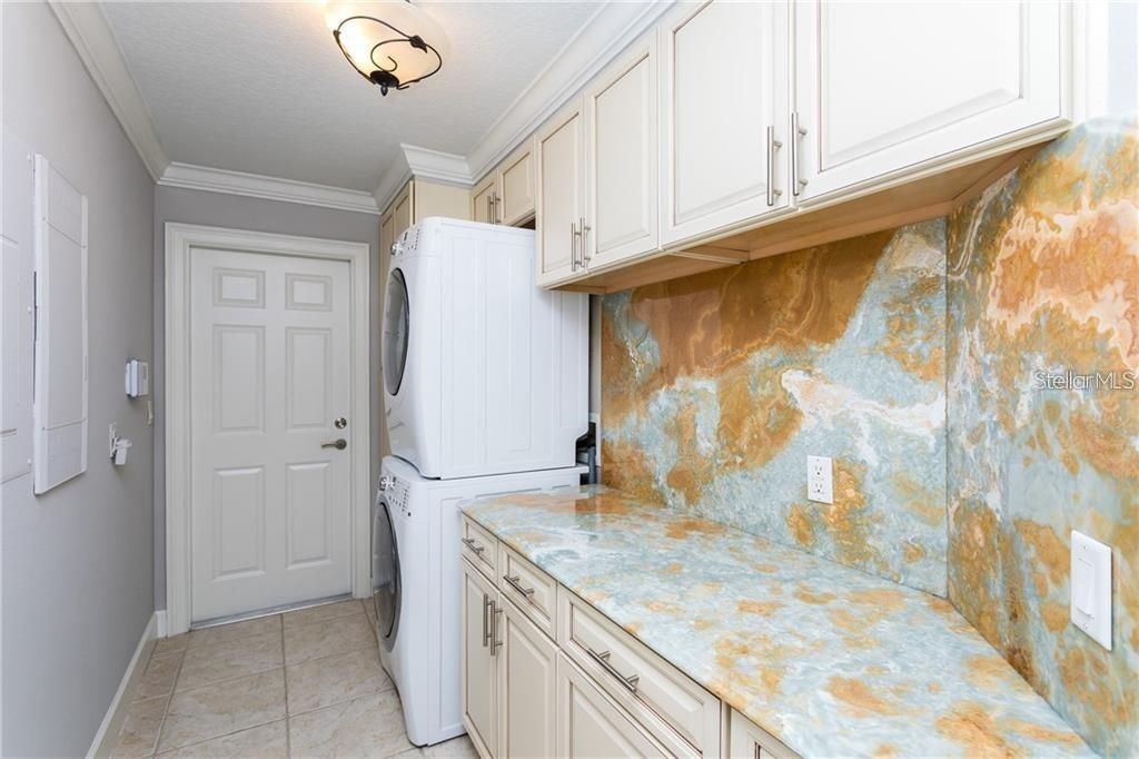 Laundry room looking at door to garage