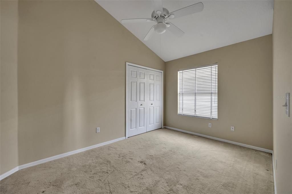 Second bedroom has vaulted ceilings