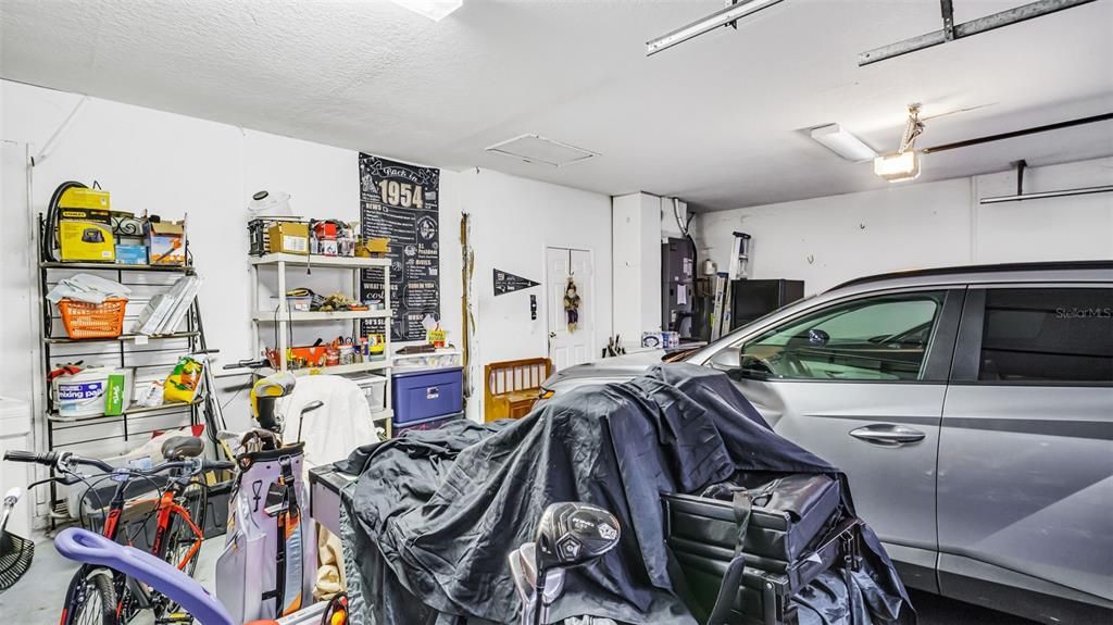 Refrigerator in Garage Stays with Property