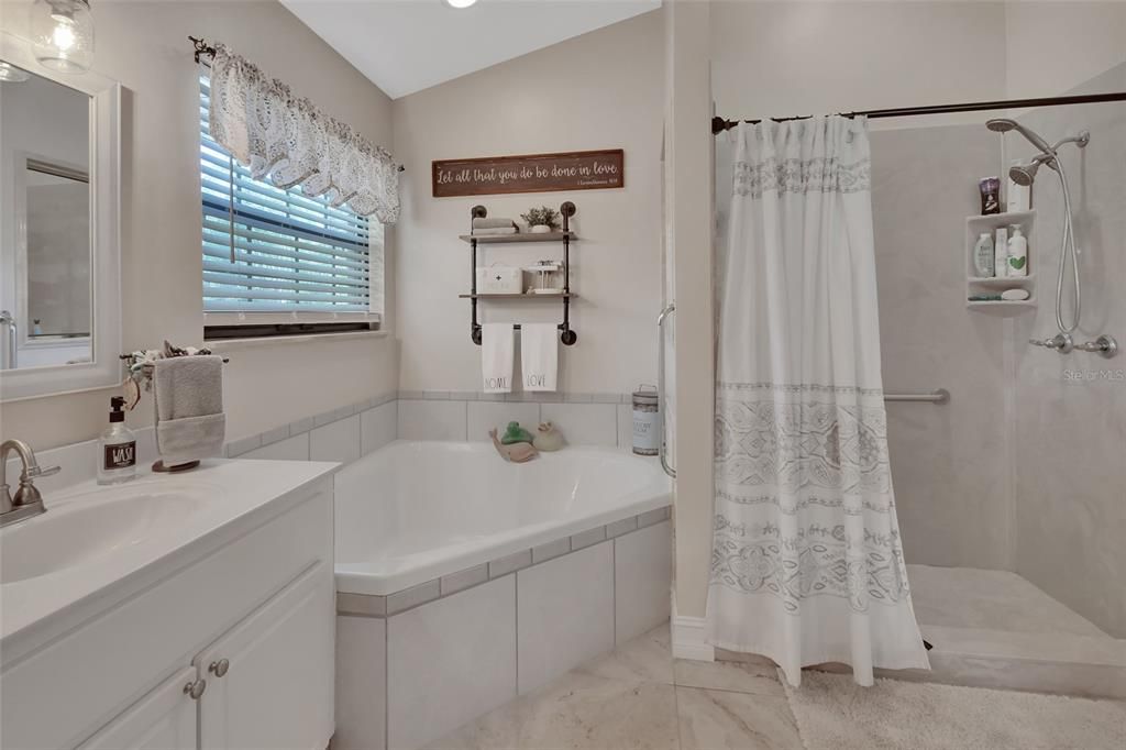 Large soaking tub, Shower with grab bars