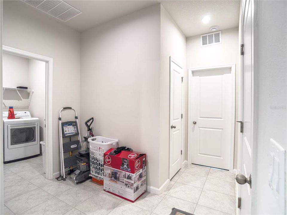 Hallway to Garage and Guest Bedroom