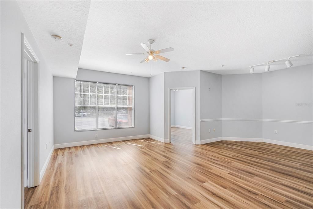 Family/Dining area viewing master bedroom