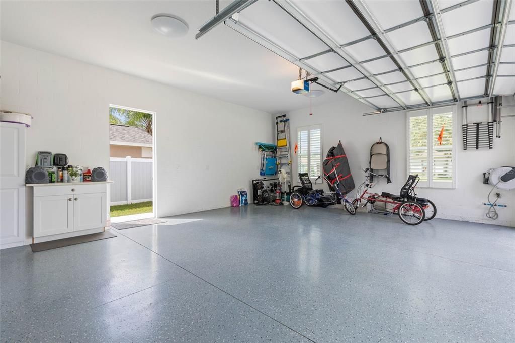 Epoxy garage with built-in cabinet for extra storage