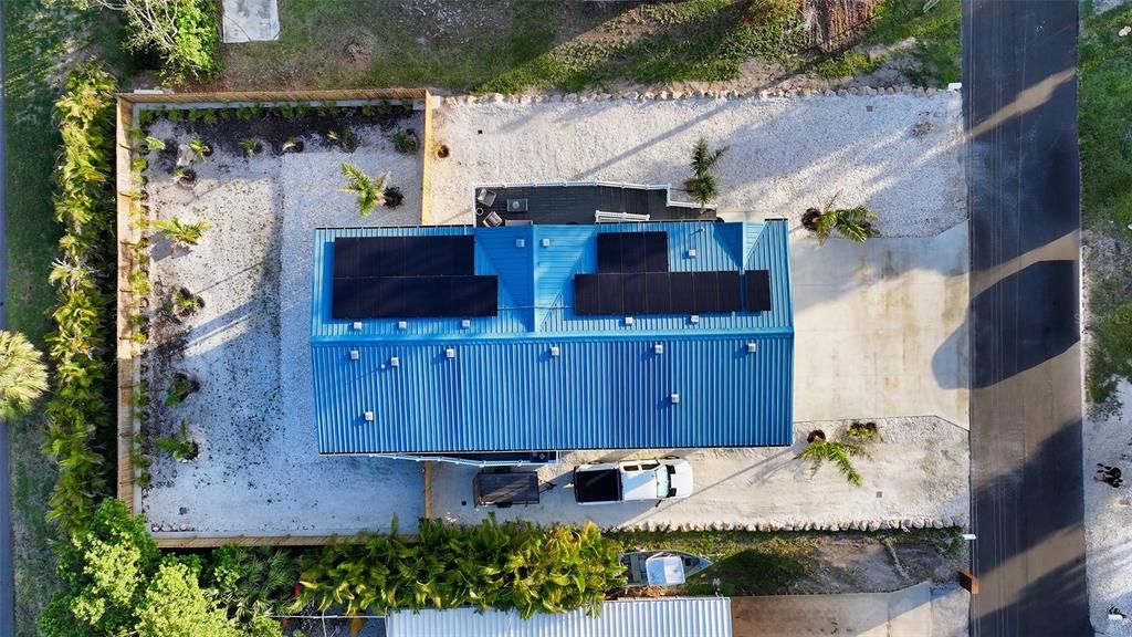 Aerial of roof and solar panels.