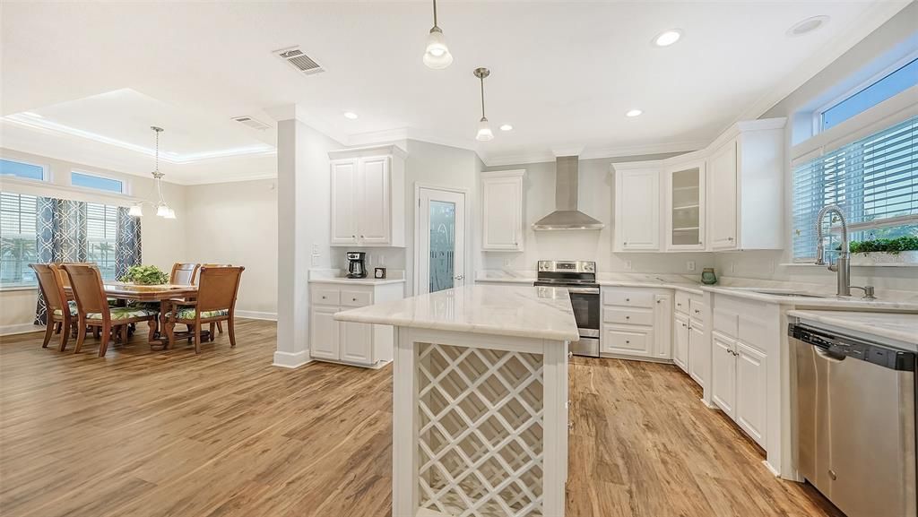 Beautiful kitchen with loads of counter space and cabinetry.