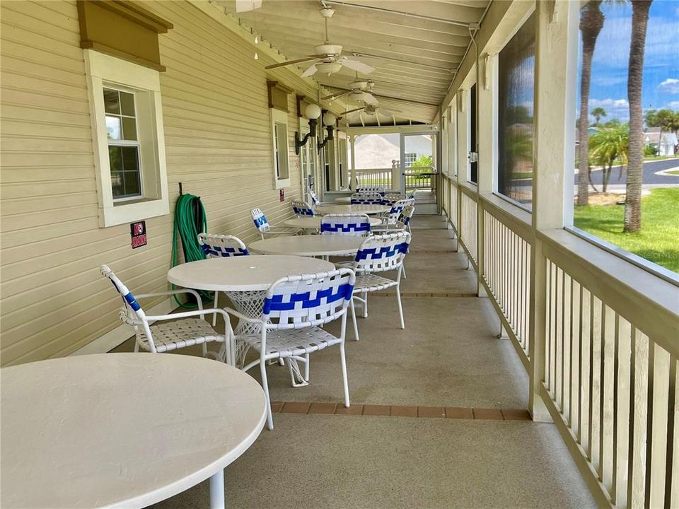 PORCH  AREA OVERLOOKING POOL, DOCK & GOLF COURSE