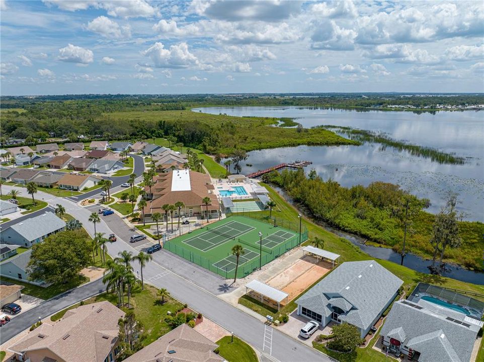 AERIAL VIEW OF COMMUNITY AMENITIES & PART OF LAKE