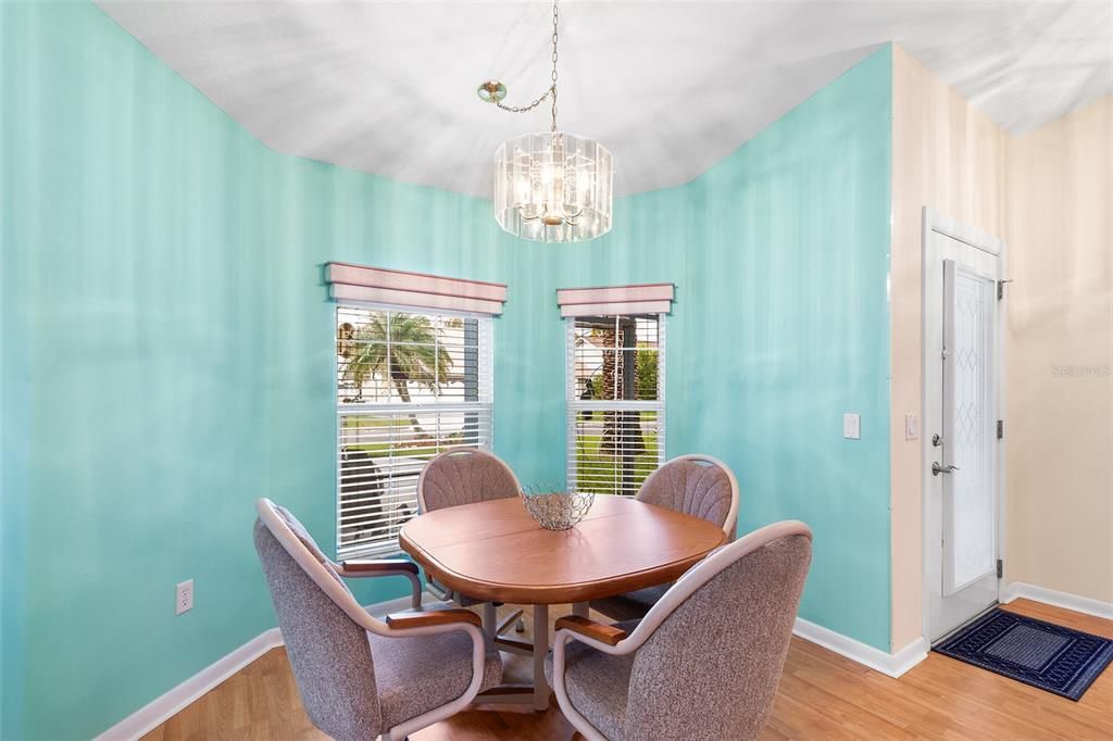 DINING ROOM WITH VIEW TOWARDS FRONT DOOR.