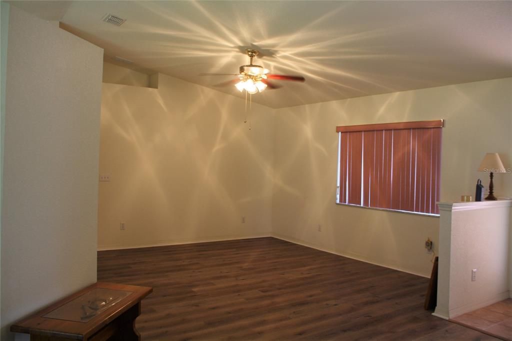 Living Room - New Vinyl Plank Flooring throughout the home