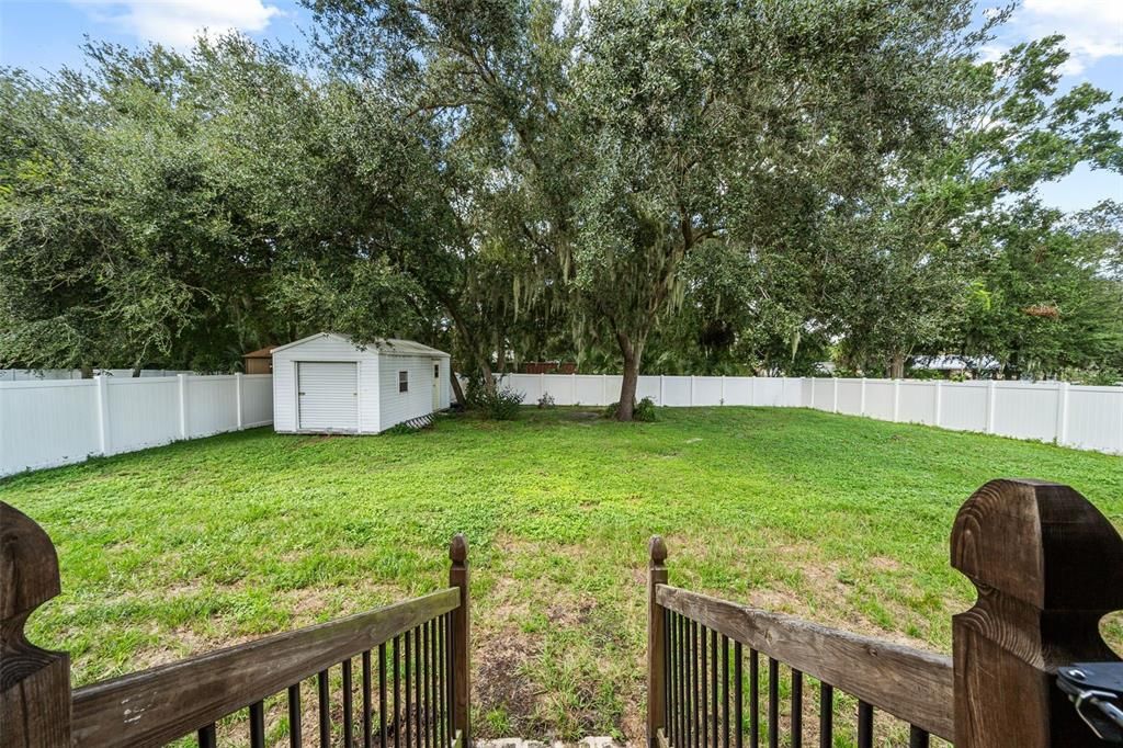 Elevated porch facing backyard