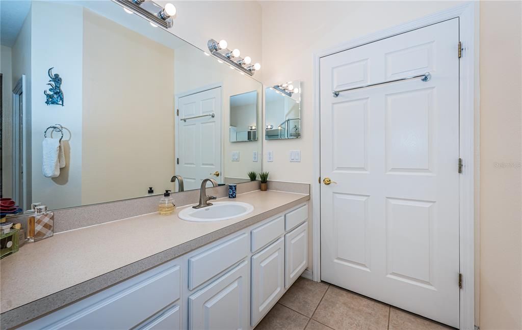 Master Bath dual vanity/ private toilet area