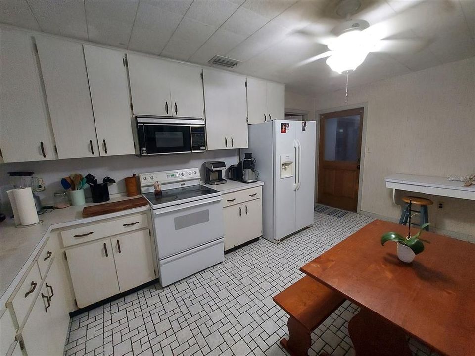 Kitchen with built in desk