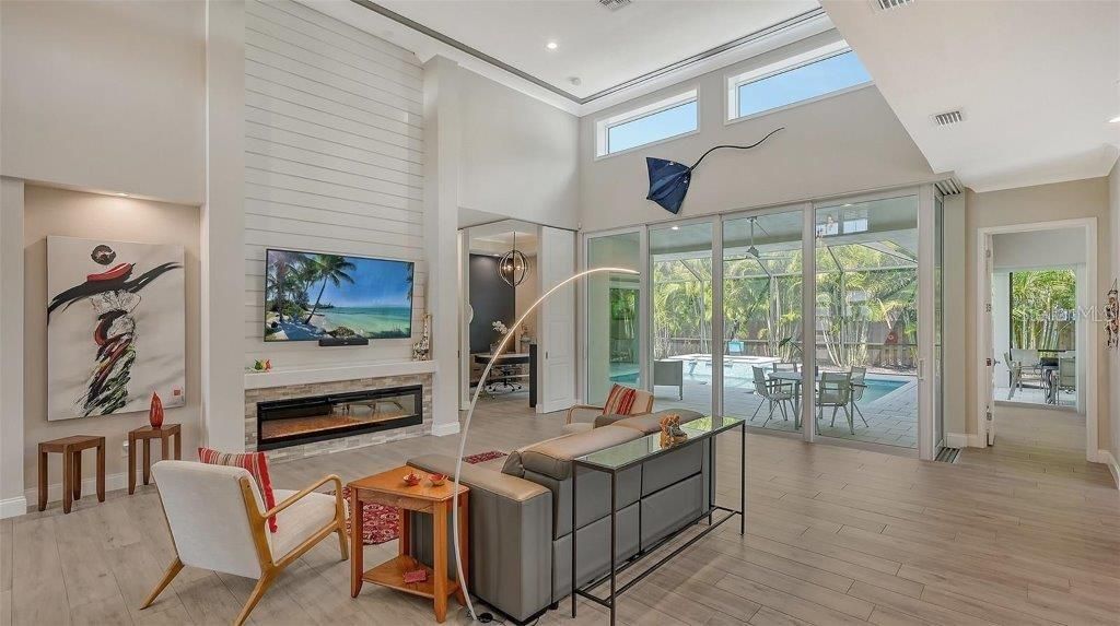 The dramatic floating tray ceiling with Halo-LED lighting