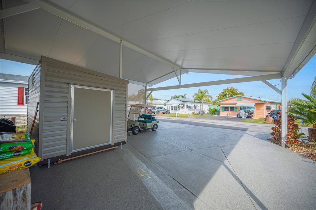 Covered patio with shed