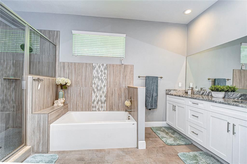 En-suite bathroom with gorgeous soaking tub and dual sinks!