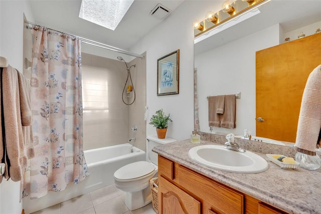 Spacious Bathroom With Additional Natural Overhead Lighting