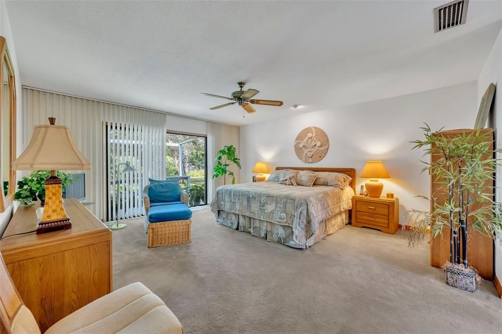 Large Bedroom With Sliding Glass Doors- Step Straight Into Your Backyard Oasis!