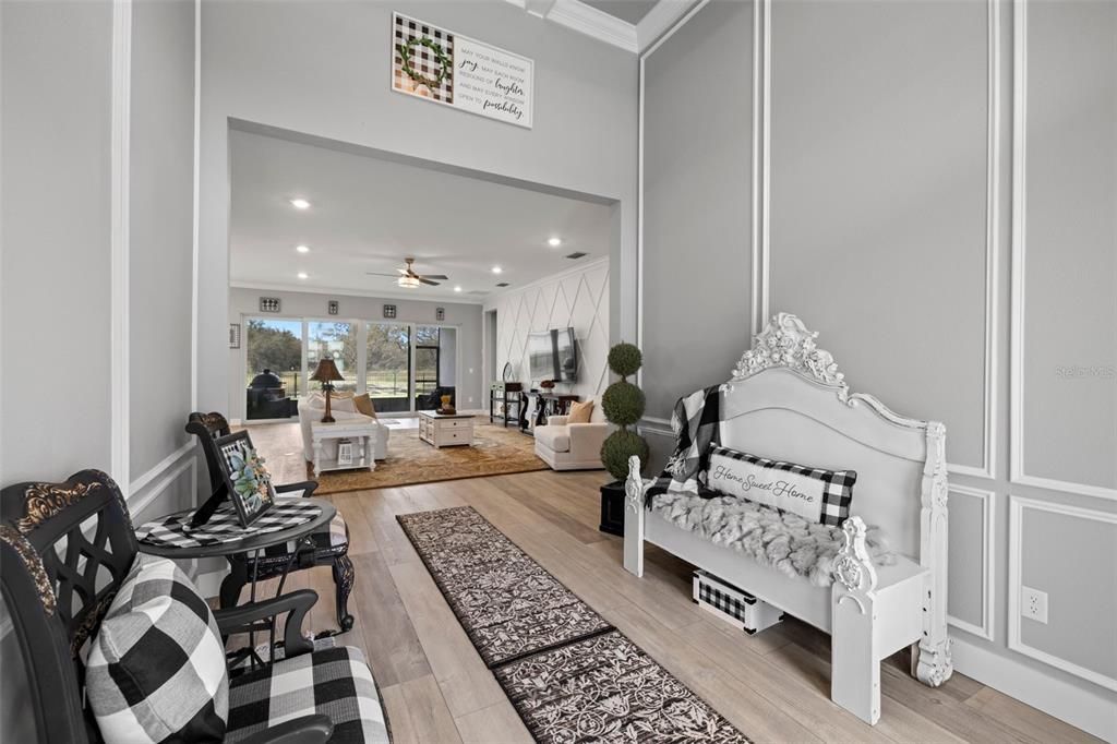 Grand Entrance Features Soaring 13'7" Coffered Ceilings