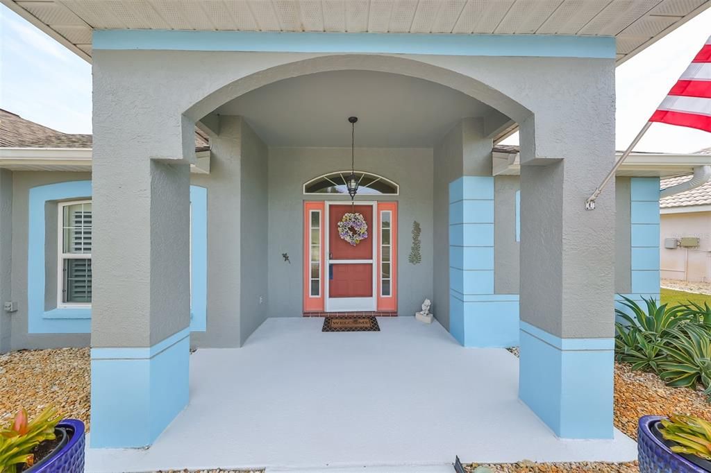 Clean, large covered entrance into the home.