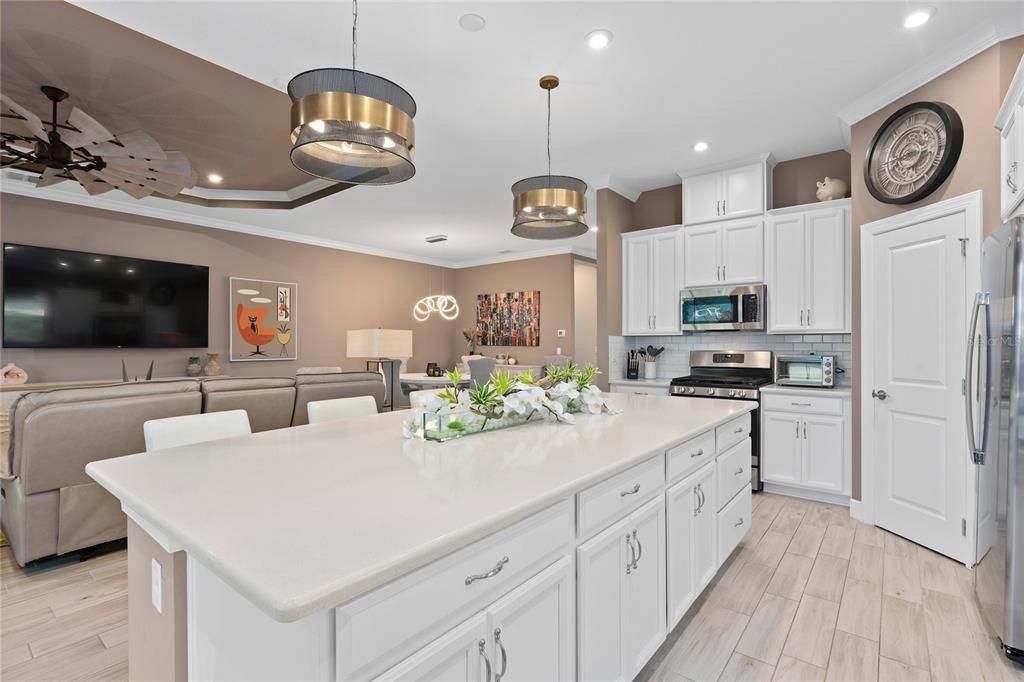 Kitchen view to the Family Room and Dining Area