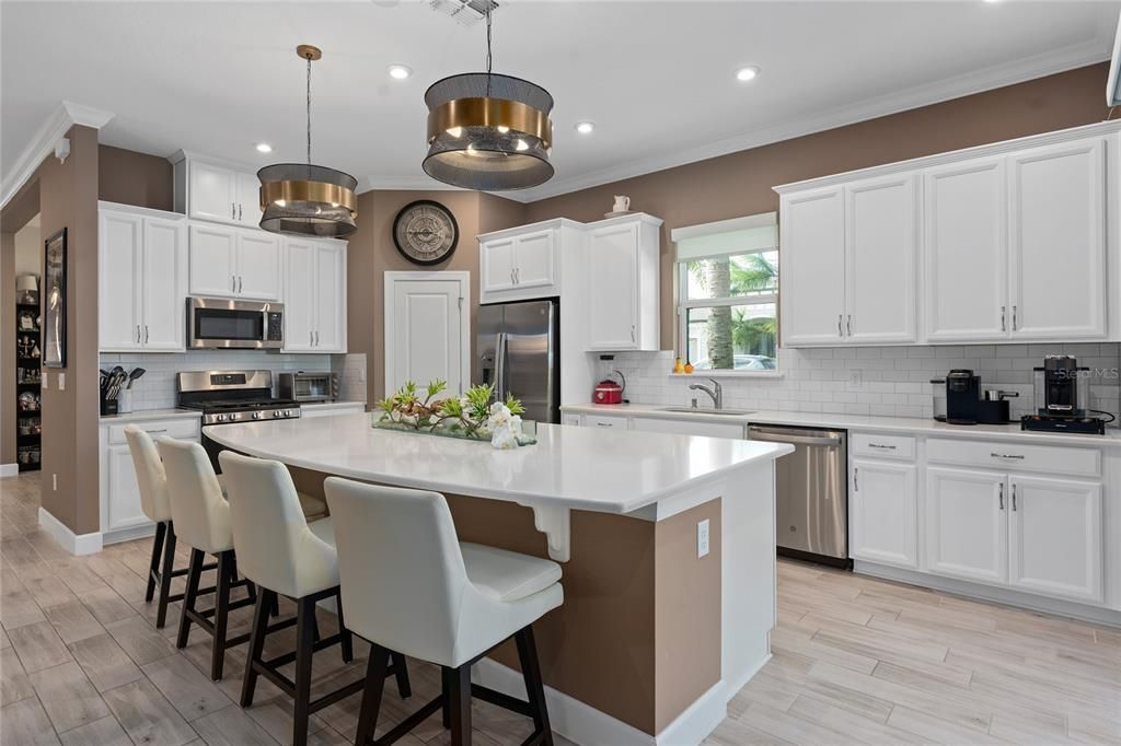 Kitchen offers plenty of counter space. All of the counters are Quartz.