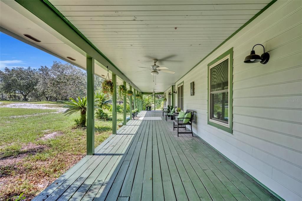 Large covered porch, perfect for every season of Florida!