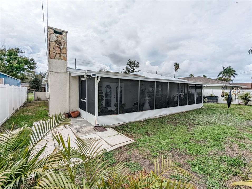 Photos are from Pre-Hurricane Helene. Florida Room and Backyard