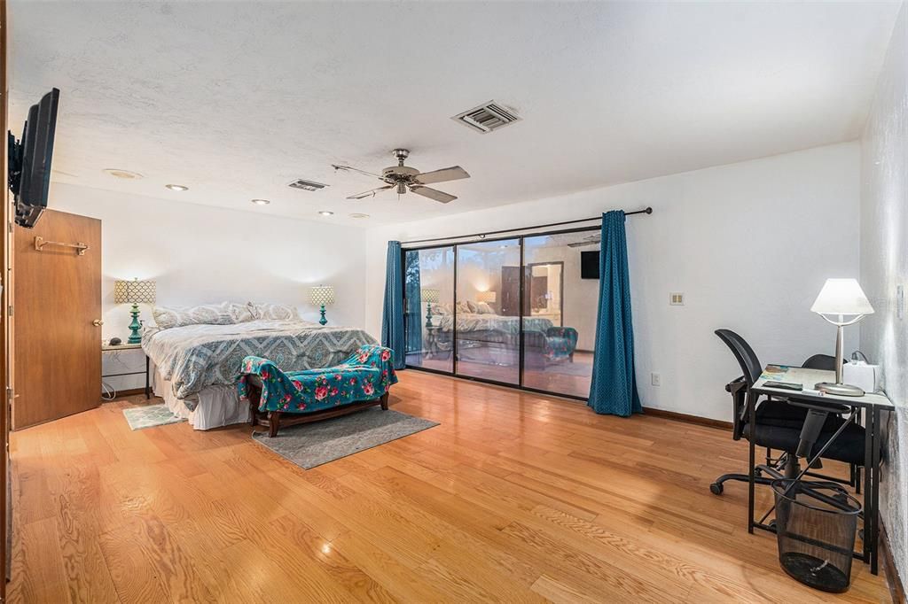 Primary Bed Room with Balcony Access and Large Walk in Closet(s)