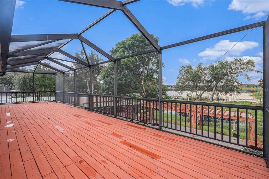 Balcony Overlooks Pool area and Lake