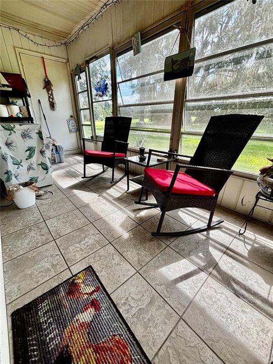 screened patio with storage room