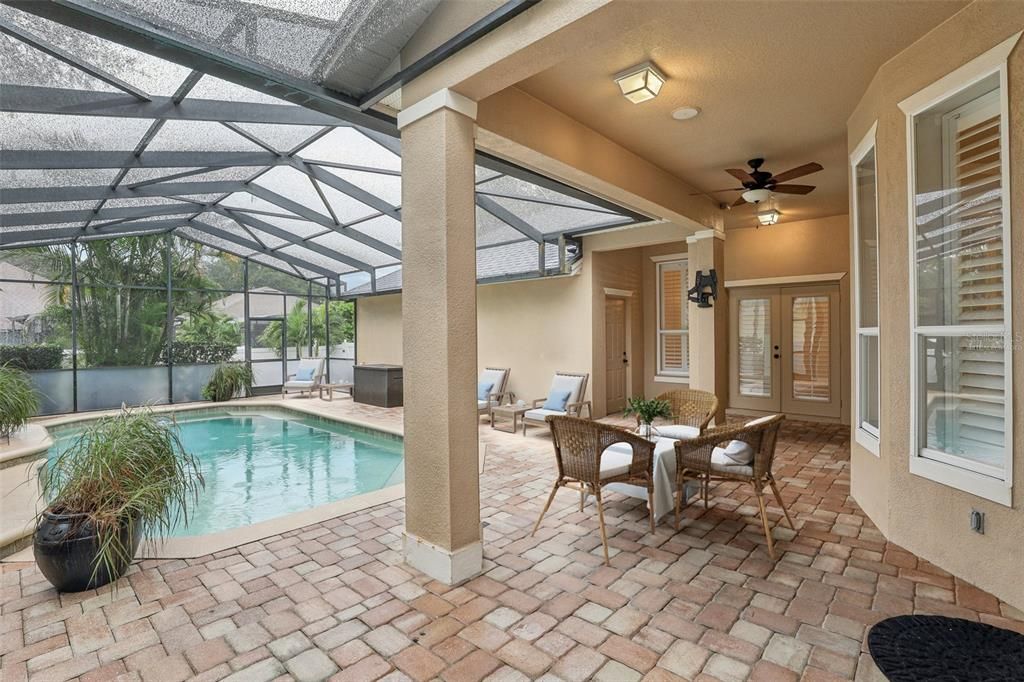 Step outside and take a moment to imagine endless days spent in the private backyard, the paver lanai is covered and overlooks your SCREENED SALT WATER POOL! Virtually Staged.