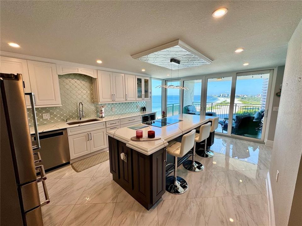 Kitchen featuring with Large Island