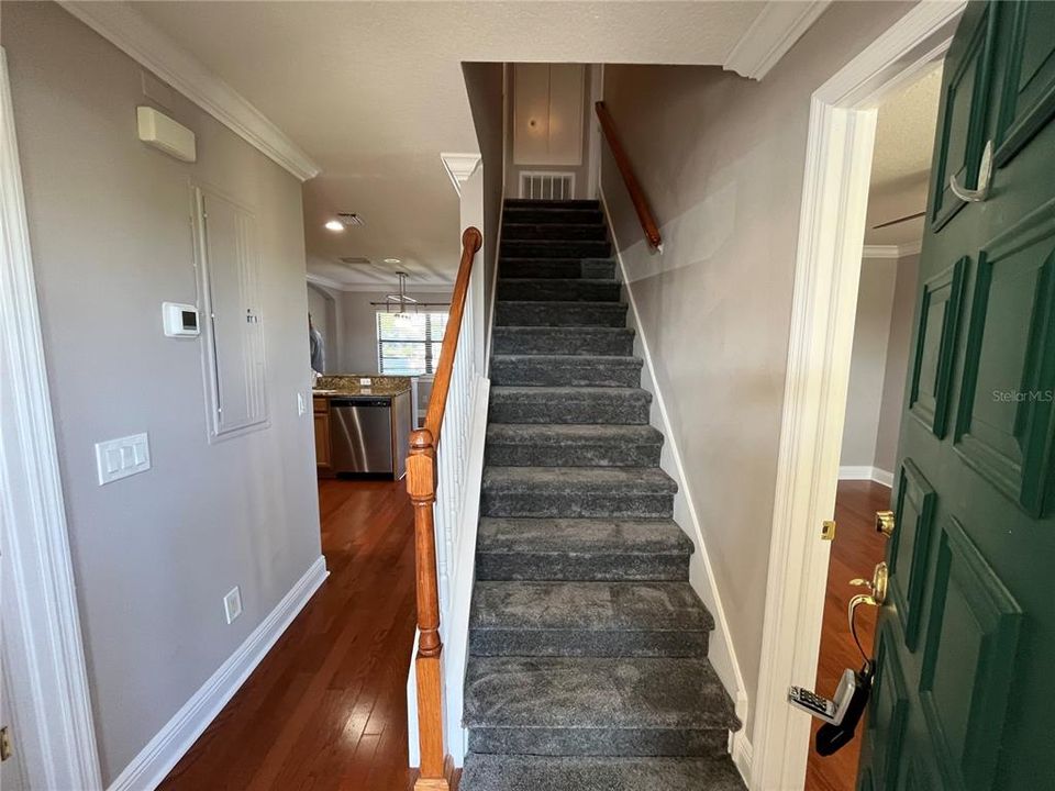 Staircase leading to bedroom #2 and Primary Bedroom