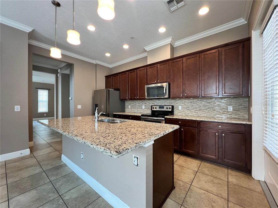 counter-height island with pendant lighting