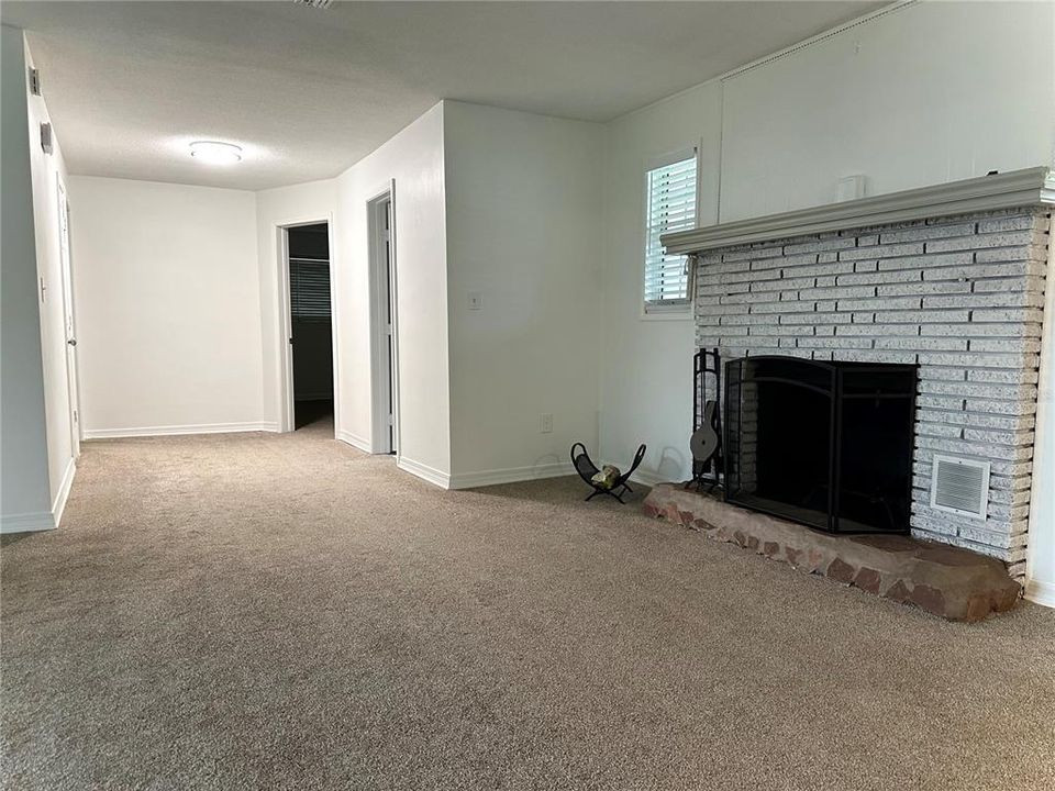 Living Room Hallway leads to Bedrooms and Guest Bath