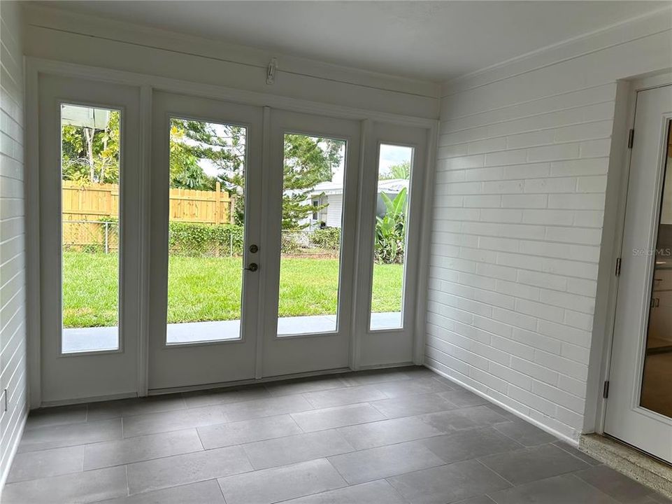 Double French Doors to outside Backyard Patio