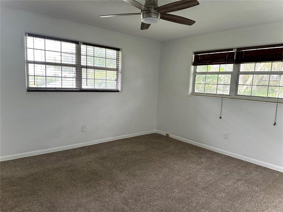 Main Bedroom with Peek-a-boo view of Intracoastal from Windows