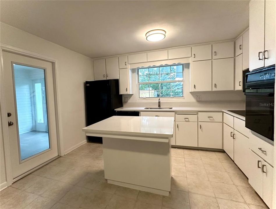 Kitchen with Glass Door to Sunroom