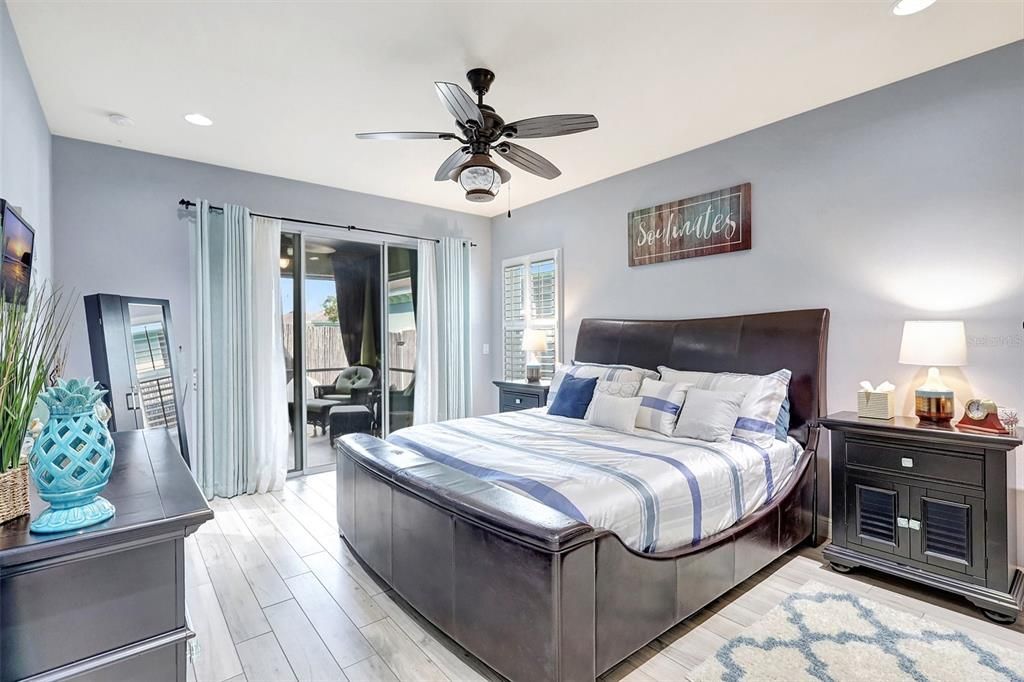 Primary Bedroom - leads to Rear Covered & Screened Porch area