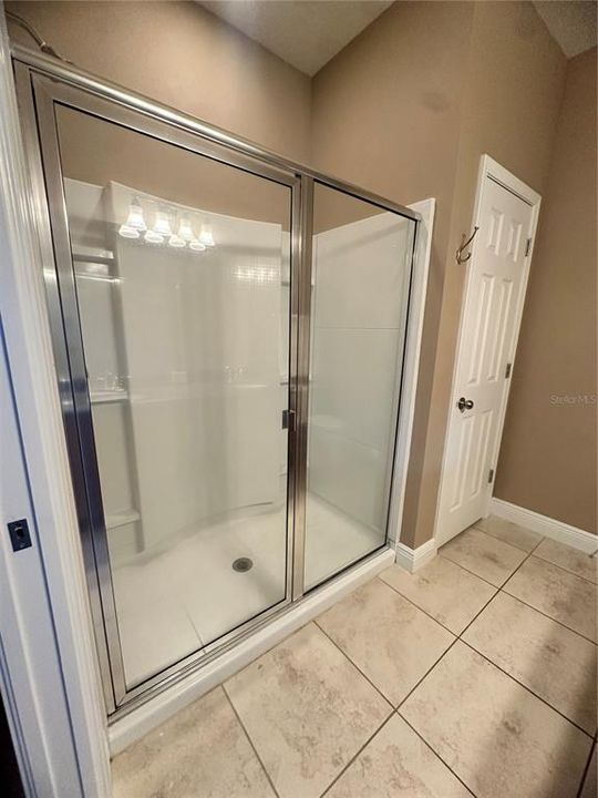 Master bath shower and linen closet