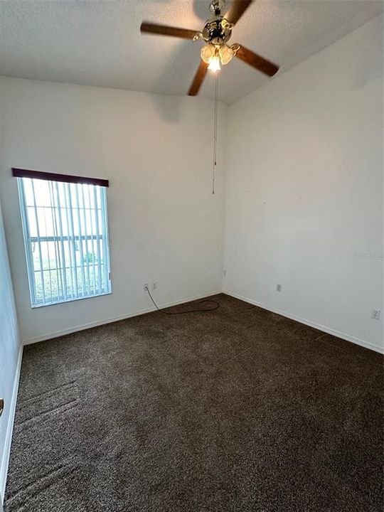 The additional room in this home could be utilized as a third bedroom or an office.  While there is no built-in closet, this flex space is large enough for either option.