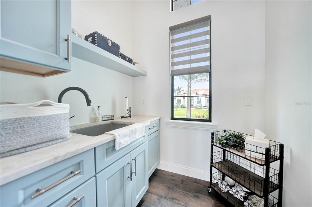 Over-sized laundry sink and gorgeous storage